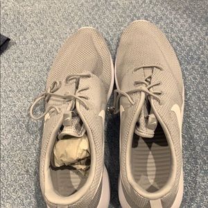 Brand new grey Nike roshe one’s size 13
